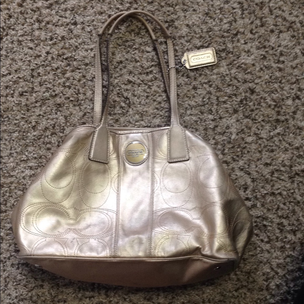Gold coach purse
